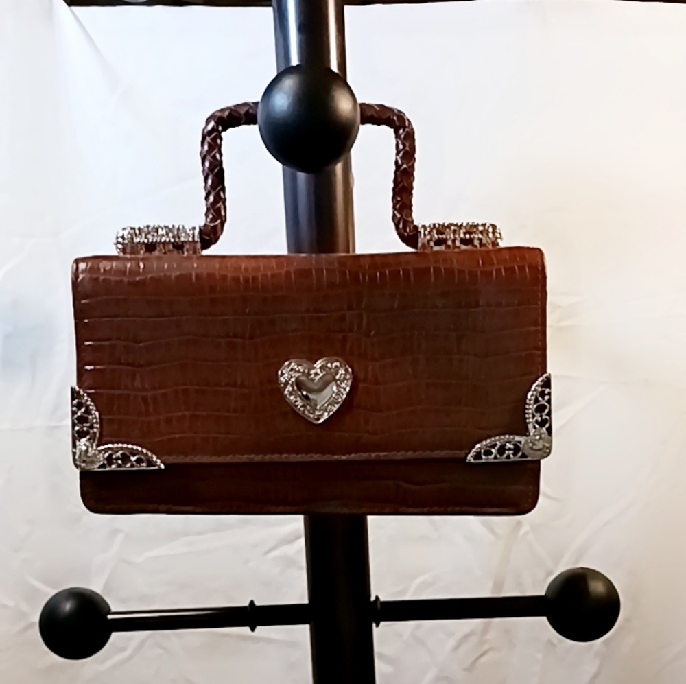 Cute purse with silver highlights. Very durable